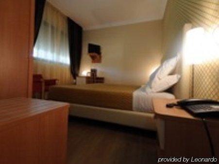 Hotel Riviera Марина-ди-Равенна Номер фото